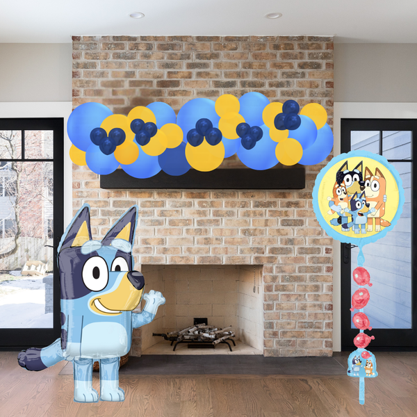 Decorative setup with Bluey character balloon and themed balloons in a living room.
