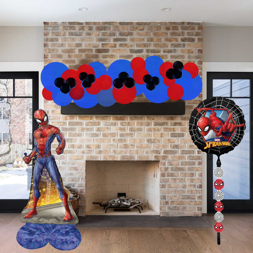 Spider-Man themed decorations in front of a brick fireplace
