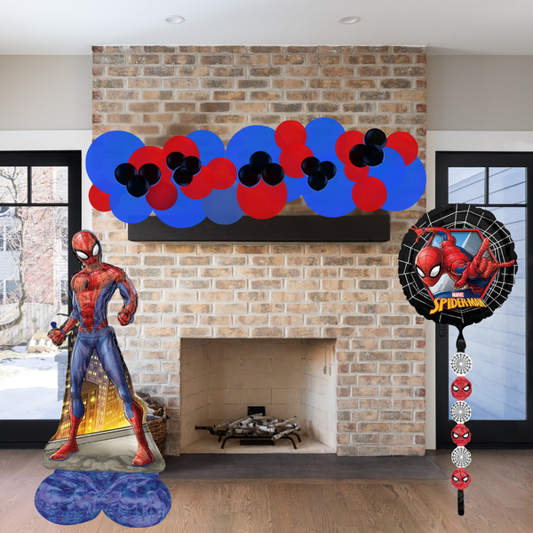 Spider-Man themed decorations in front of a brick fireplace